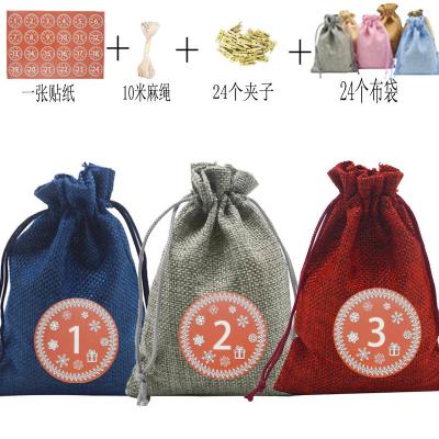 China Modern BSCI SJ0927 Stocked Candy Bag Child Gifts 24 Numbers Rope Color Canvas Christmas Calendar for sale