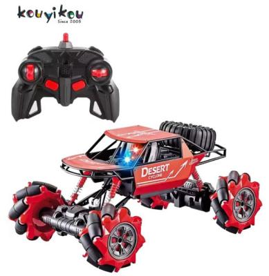 China Kouyikou Auto Return Multi Function Smoke Climber Remote Control Spray Car with Running Bright Light for Kids for sale