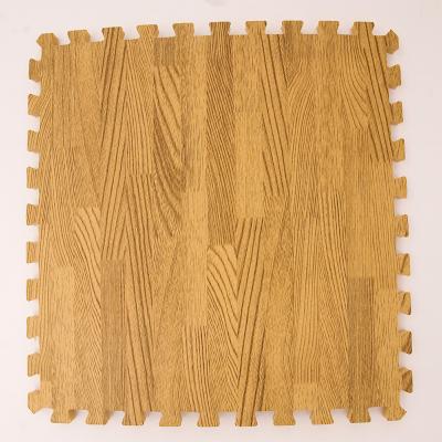 China Household Color Puzzle Waterproof Floor Pad EVA Soft Mat Light Solid Wood EVA Mat for sale