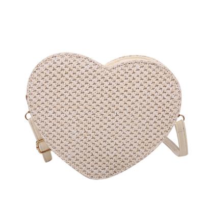 China Women Mini Beach Tote Bag Amazon Fashionable Crossbody Bag For Straw Shoulder Straps Messenger Handbag Heart Shape Rattan High Quality for sale