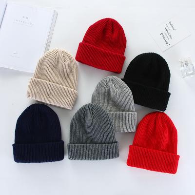 China COMMON Custom Beanie Hats Designer Custom Unisex Long Ribbed Acrylic Cuffed Plain Knitted Hat Amazon Hot Sale for sale