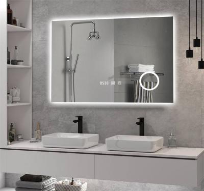 China Popular Magnifying Anti-fog Device Smart Touch Screen Led Mirror Bluetooths Digital Pendulum Smart LED Bath Light Mirror for sale