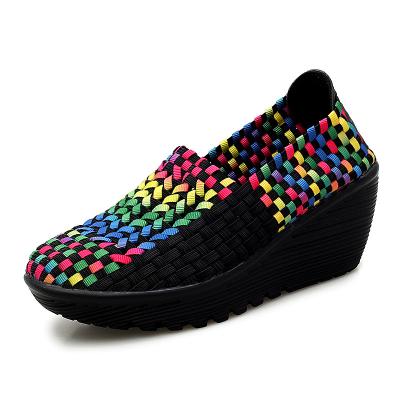 China 2022 breathable new woven hollow wedge plus size women's shoes fashion garden shoes flat casual shoes for sale