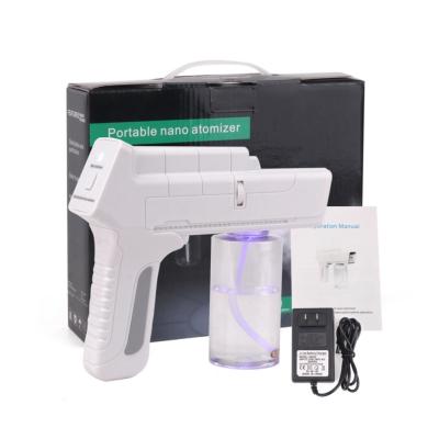 China Cordless Spray Gun for Disinfection 110V 220V 1200W 350ML Blue Light Nano Steam Machine Ultra Fine Water Mist Sprayer Gun for sale