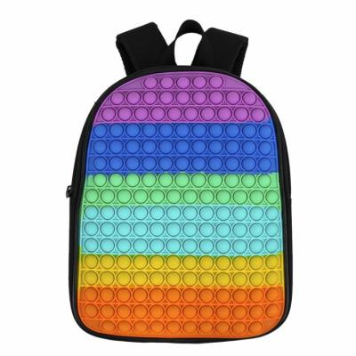 China Ergonomic Design Custom 12 Inch Candy Color Kids Popit Bubble Silicone Busty Puzzle Bag Kids School Backpack Bag for sale