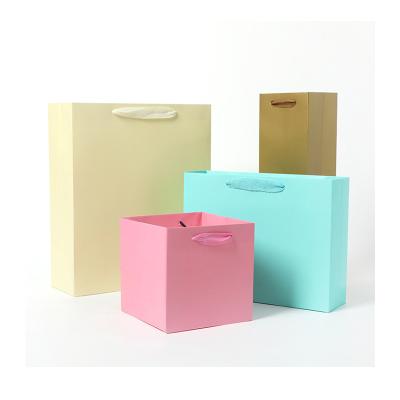 China Recyclable Mini Recycled Wax Gift Paper Bag Blue Dupont Bread Airtight Strong Lacquered Paper Bag for sale