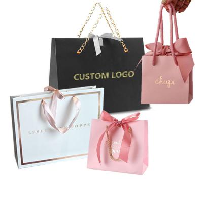 China Customized Recyclable Printed Kraft Paper Shopping Bag With Twist Handle Gift Apparel Packaging Kraft Paper Bag for sale