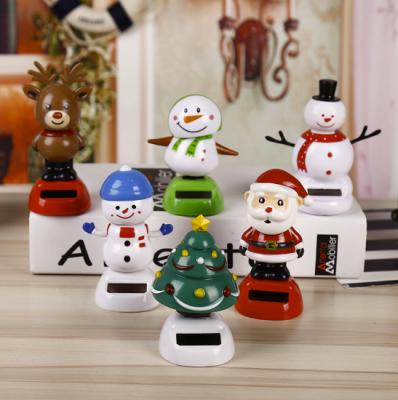 China Cute Christmas Decor Custom Make Plastic Solar Powered Dancing Toys Figures For Car Window for sale