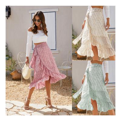 China 2021 spring cotton flower wrap boho skirt summer clothing anti-static floral asymmetrical skirt women maxi skirt for sale