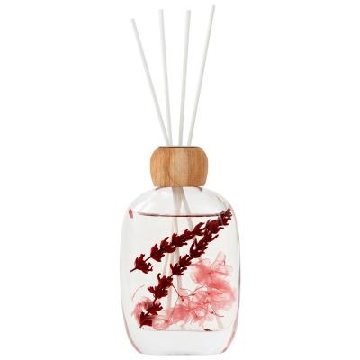 China Luxury Free Home Dry Aroma Scented Fire Blossom Aromatherapy Air Freshener Gift Essential Oil Aroma Scented Reed Diffuser for sale