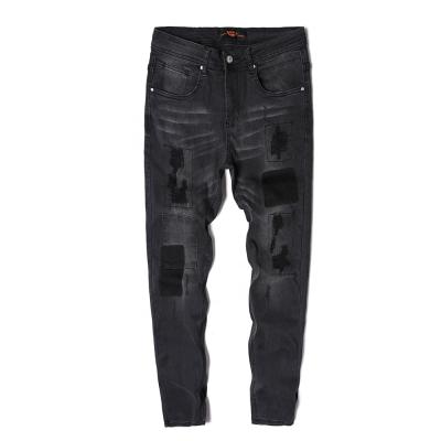 China Wholesale Fashionable Good Quality Fade Proof Color Distressed Slim Fit Black Stretch Ripped Jeans Pants For Men for sale