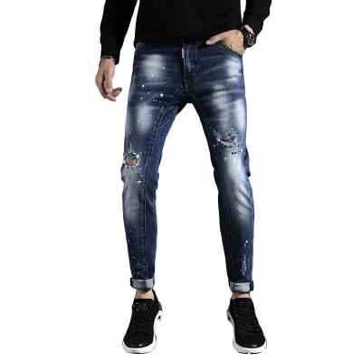 China Breathable Custom Stylish Printed Ripped Dark Blue Slim Fit Mens Jeans With Patches for sale