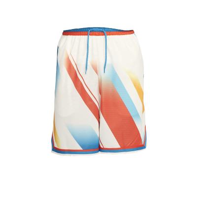 China Cheap Breathable Custom 100% Polyester Basketball Shorts Colorful Logo Sublimated Basketball Uniforms for sale