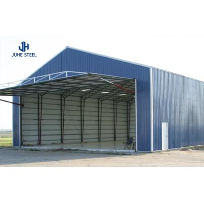 China Q235B/Q345B Low Carbon Steel Prefabricated Light Metal Frame Aircraft Hangar Construction for sale