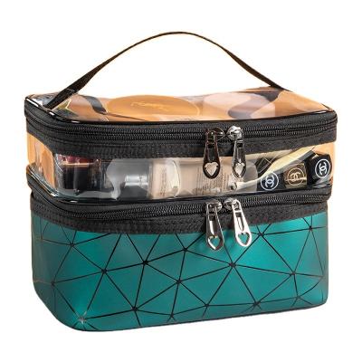 China Hot Selling TPU Large Capacity Double Layers Makeup Bag Geometric Portable Waterproof Cosmetic Case for sale