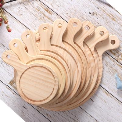 China Viable Customize Different Materials Kitchen Supplies Round Wooden Pizza Serving Board for sale