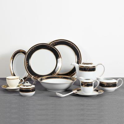 China Sustainable Wholesale High Quality Black And Gold Hotel Home Used Luxury Dinnerware Porcelain Dinnerware Set for sale