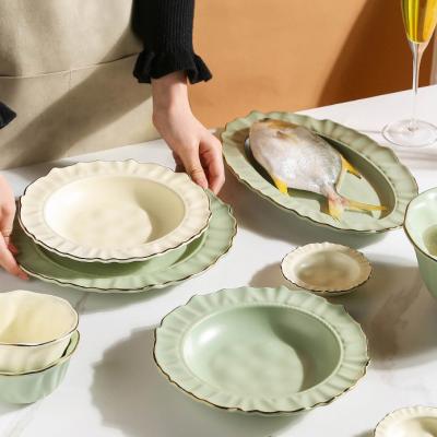 China Sustainable matte luxury nordic green and yellow glaze ceramic dishes porcelain fish soup pasta noggin cheap kitchen dish with gold rim for sale