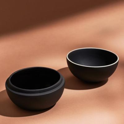 China Viable Wholesale Unique Design Kitchenware Matte Black Spherical Condiments Seasoning Pot Ceramic Spice Jar For Salt Sugar for sale