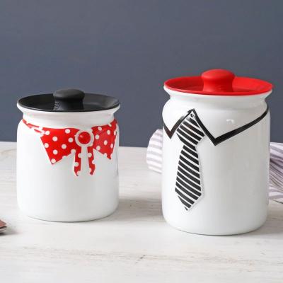 China European style embossed tie pattern kitchen tools ceramic coffee tea canister viable with silicone lid for sale