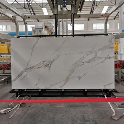 China GUCI Wholesale Natural Elegant Marble Slab Style Continuous Pattern Calacatta Carrara Design Agglomerated Stone Wall Tile for sale