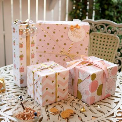 China Disposable Gift Bag Festival Birthday Party Halloween Christmas Paper Gift Wrapping Bag Gift Wrapping Paper for sale