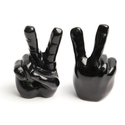 China China hand carved natural crystal finger carving black obsidian engraved crafts for home decor for sale