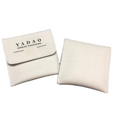 China Yadao Wholesale Pouch PU Leather White Jewelry Packaging Bag With Magnet for sale