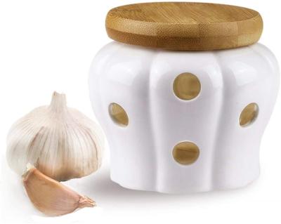 China Freshness Preservation Garlic Keeper Ceramic Vented Garlic Storage Container White Stoneware With Bamboo Lid for sale