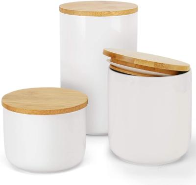 China Freshness Preservation Food Storage Jar Ceramic Food Container with Bamboo Lids for sale