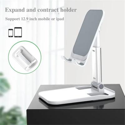 China 2011 hot sale universal adjustable foldable mobile wireless phone desk laptop desktop silicone foldable brush holder for sale