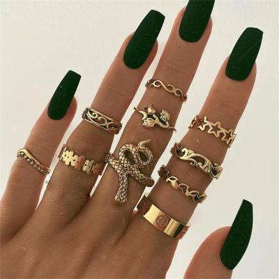 China 9pcs/set Environmental Friendly Rose Flower Star Snake Gold Plated Rings For Women Summer Popular Hollow Ring Set Finger Jewelry for sale