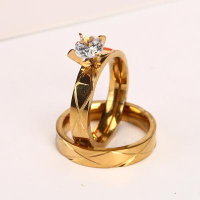 China Stainless Steel Cross Diamond Ring Shiny Gold Hiphop Laodun and Silver Stripe Set Lovers Ring For Women Men for sale