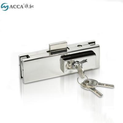 China Frameless Glass Door Center Lock Stainless Steel Covered for 8-12mm Glass Door Lock for sale