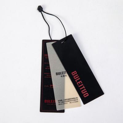 China Viable Custom Logo Custom Swing Hang Tag Witch Paper Clothing Tag For Garment Accessories for sale