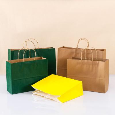 China Recycled Materials Manufacture Direct Cheap White Paper Carry Bag Customized Logo Kraft Shopping Bag With Handle for sale