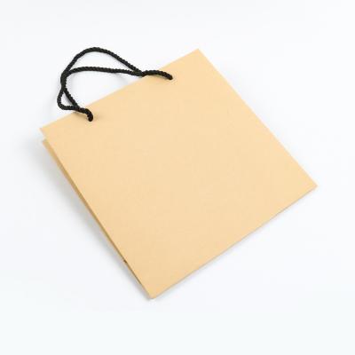 China Wholesale Recycled Printed Materials CMYK Logo Luxury Retail Boutique Shopping Jewelry Gift Customize Kraft Paper Brown Paper Bags With Your Own Logo for sale