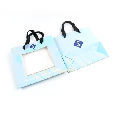 China Recycled Materials Customize Design Kraft Fancy Craft Paper Gift Bags Printing OEM Custom Industrial Outdoor Packaging Paper Bags With Windows for sale