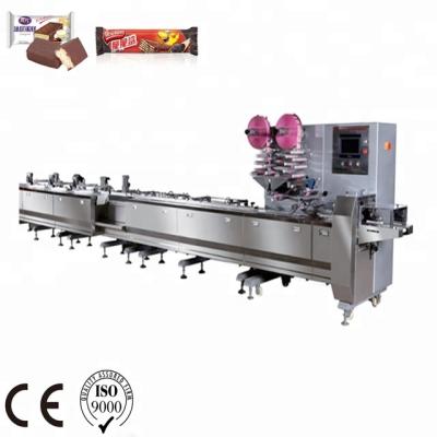 China GARMENT Double Roll Paper Chocolate Package Machine Automatic Feeding Pillow Type Automation And Flow Wrapping Wrapping Equipment for sale