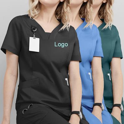 China Eco-friendly Breathable Polyester Women Medical Hospital Printed Nurse Uniform Top+Pant Scrub Top for sale