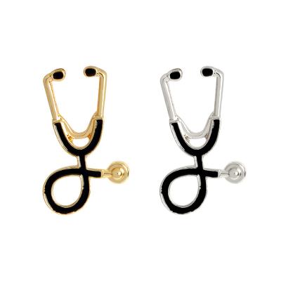 China Christmas Hot Sale Rose Gold Algeria Soft Enamel Stethoscope Brooches Pins Medical Stethoscope Lapel Pin Badge Brooch for sale