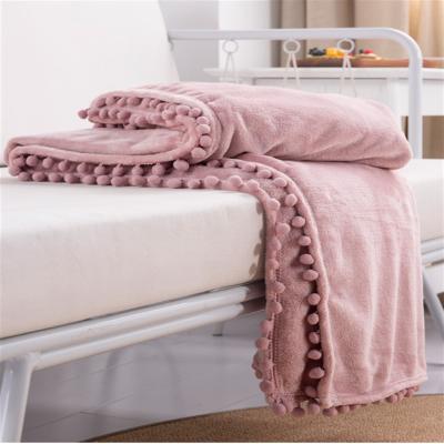 China Dormitory Ball Tassel Flannel Treatment Blanket Solid Color Anti-Static High Quality Covering For Sofa for sale