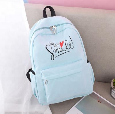 China Schoolbag Female Pure Color Waterproof Wholesale Student Canvas Single Bag Increasing School Backpack for sale