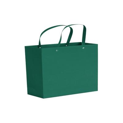 China Portable Recyclable Custom Paper Bag With Handles Low Cost for sale