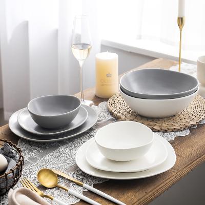 China Christmas Viable Nordic Style Unique Design Pebble Shape Matte Shape Dinner Table Set Ceramic Dish and Bowl for sale