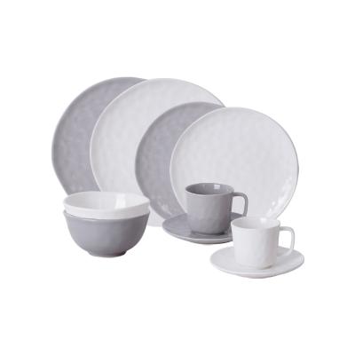 China Viable Unique Design Irregular Shaped Hotel Dinnerware Dishes And Bowls Porcelain Coffee Cup With Saucer Ceramic Dinnerware Sets for sale