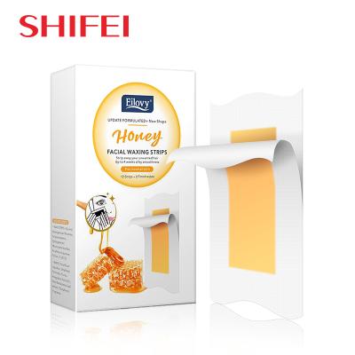 China Wax+non-woven strips hair removal wax paper long lasting silky anti-allergic hair removal wax strips for sale