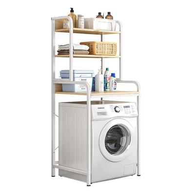 China Sustainable tiered metal bathroom shelves above wooden washing machine storage rack for sale