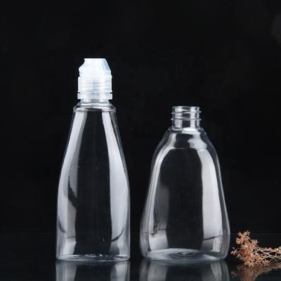 China Factory Stock Food Sauce Bottle 500g Flat Squeezable Transparent Honey Bottle Shape 360ml 12oz Plastic Juice Bottle for sale