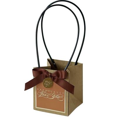 China Recyclable Original Manufacturer Wedding Candy Bags Gift Bags With Handle for sale